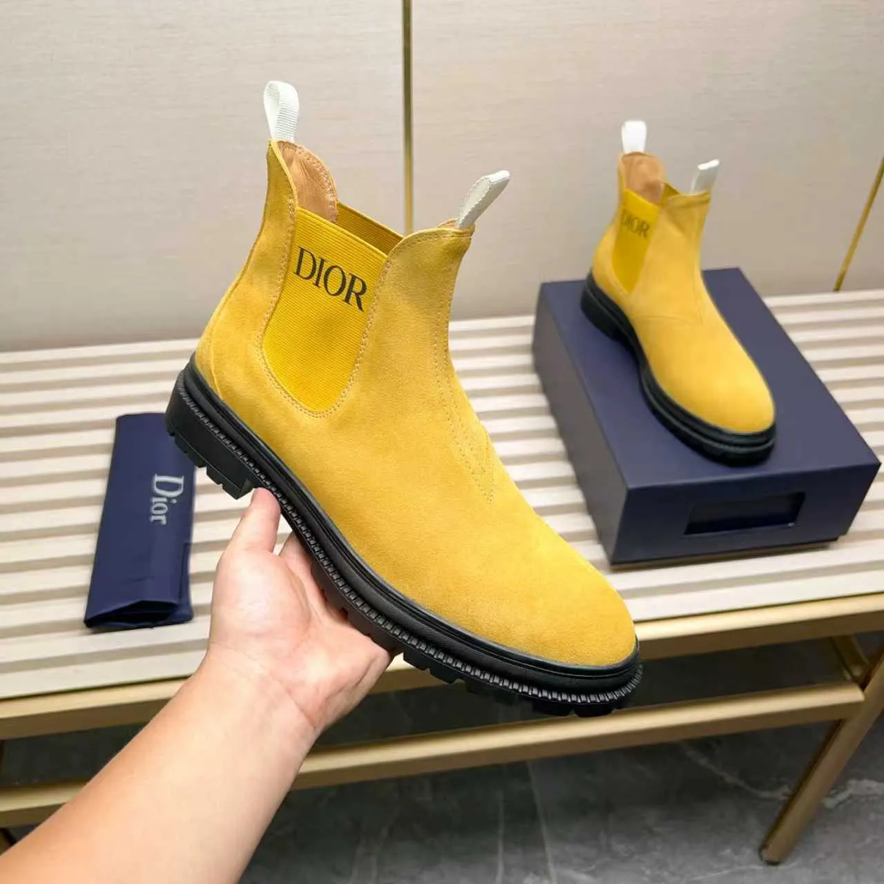 Men's Shoes 💰480 Dior A practical choice that combines protection with classic style. Made from durable Rugged Calf leather, it's tumbled and hand-finished to create a soft suede feel with a rich texture. Elastic side panels and subtle cutouts are inspired by the classic Chelsea boot. Leather upper and lining with Kummel tabs at front and rear, rubber outsole